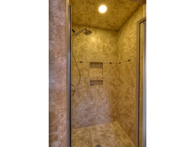 Welcome to Grand View Falls, where this custom-built residence - photo 34