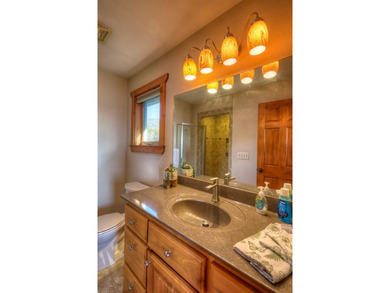 Welcome to Grand View Falls, where this custom-built residence - photo 36