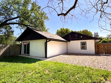 *FLAT YARD, ONE LEVEL, OUTBUILDING, NO CARPET*SO much has been - photo 4