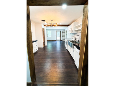 *FLAT YARD, ONE LEVEL, OUTBUILDING, NO CARPET*SO much has been - photo 7