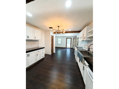 *FLAT YARD, ONE LEVEL, OUTBUILDING, NO CARPET*SO much has been - photo 8