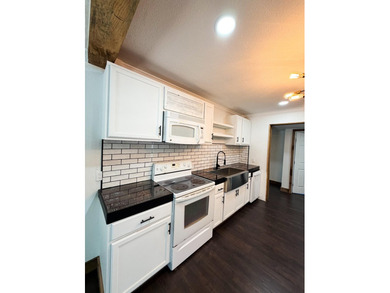 *FLAT YARD, ONE LEVEL, OUTBUILDING, NO CARPET*SO much has been - photo 10