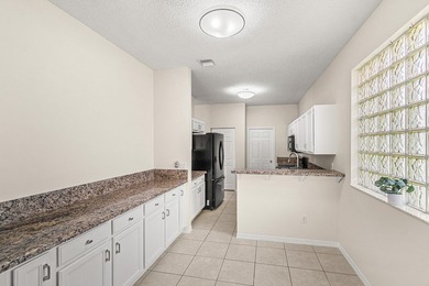Welcome home to this beautifully updated home with 2024 roof and - photo 9