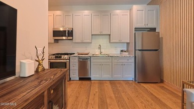 Located in the heart of the Historic Grand Lake Village, this is - photo 3
