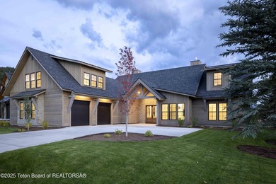 This custom home in Teton Reserve offers a unique plan with - photo 2