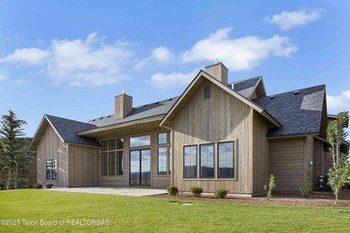This custom home in Teton Reserve offers a unique plan with - photo 9