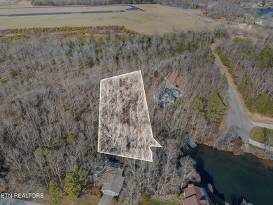 Beautiful wooded lakefront lot on Holiday Hills Lake, located in - photo 4