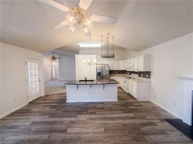 5702 River Glen Dr is a one-story Greensboro home with a - photo 2