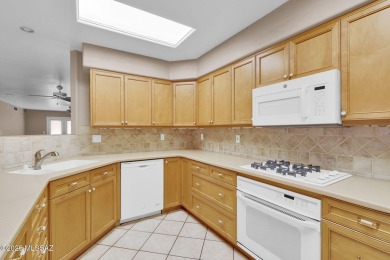 Welcome to this beautifully maintained 3-bedroom end unit in the