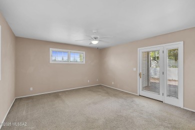 Welcome to this beautifully maintained 3-bedroom end unit in the