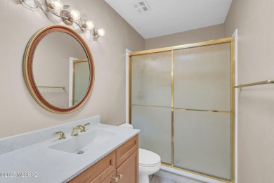 Welcome to this beautifully maintained 3-bedroom end unit in the