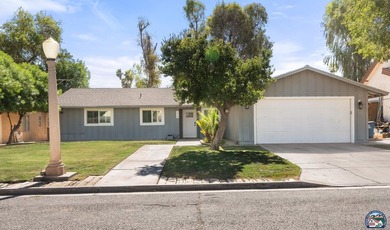 Beautifully updated golf course home. This 3-bedroom, 2-bathroom - photo 1