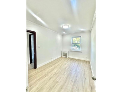 BEAUTIFULLY RENOVATED BRICK SINGLE -FAMILY HOME IN A PRIME - photo 13