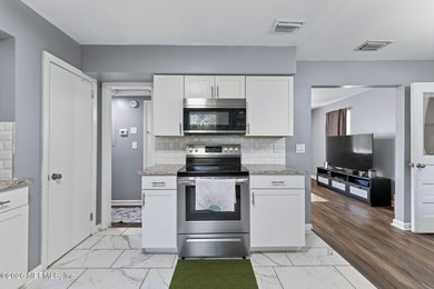 Move-in ready, tastefully renovated, and backed by a - photo 9