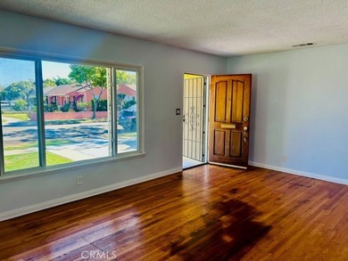 Welcome to this charming 4-bedroom, 2-bathroom Long Beach home - photo 3