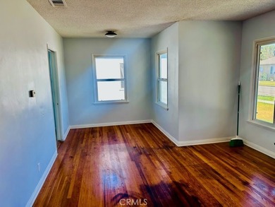 Welcome to this charming 4-bedroom, 2-bathroom Long Beach home - photo 4