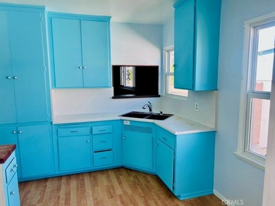Welcome to this charming 4-bedroom, 2-bathroom Long Beach home - photo 5