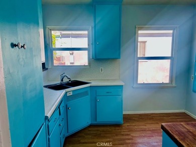 Welcome to this charming 4-bedroom, 2-bathroom Long Beach home - photo 6