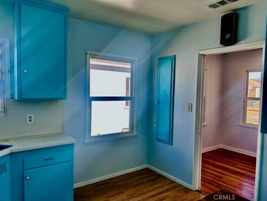 Welcome to this charming 4-bedroom, 2-bathroom Long Beach home - photo 7