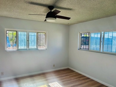 Welcome to this charming 4-bedroom, 2-bathroom Long Beach home - photo 9