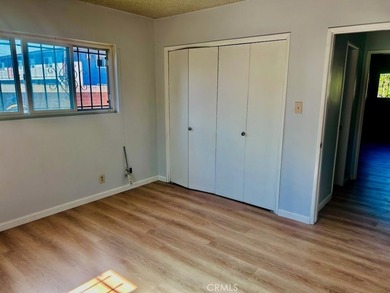 Welcome to this charming 4-bedroom, 2-bathroom Long Beach home - photo 10
