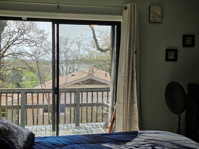 Seasonal Lakeview of Crown Lake from Primary bedroom and deck - photo 13