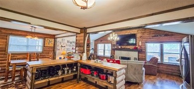 LAKEFRONT RUSTIC CHARM + PLATFORM DOCK!! Nestled along the