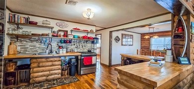 LAKEFRONT RUSTIC CHARM + PLATFORM DOCK!! Nestled along the