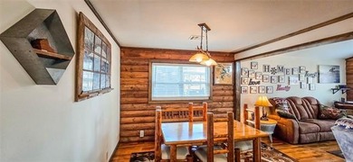 LAKEFRONT RUSTIC CHARM + PLATFORM DOCK!! Nestled along the