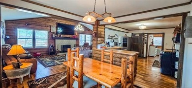 LAKEFRONT RUSTIC CHARM + PLATFORM DOCK!! Nestled along the