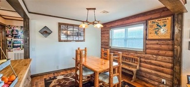 LAKEFRONT RUSTIC CHARM + PLATFORM DOCK!! Nestled along the