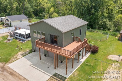 Lake Home For Sale in Stanton, Michigan