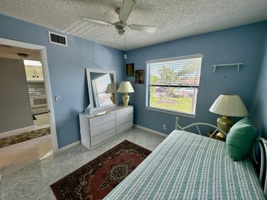 Welcome home to your well-maintained 2BR/2BA condo just steps - photo 25