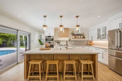 Stunning fully renovated four-bedroom, three-bath modern - photo 3