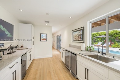 Stunning fully renovated four-bedroom, three-bath modern - photo 4