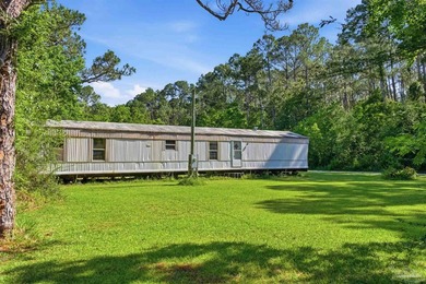 This 5.87-acre LDR-zoned property offers a quiet country setting - photo 29