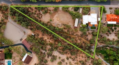 Nestled on a sprawling 1.80-acre parcel surrounded by the