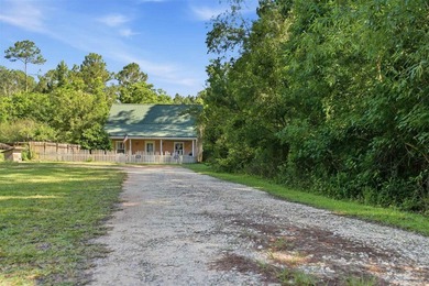 This 5.87-acre LDR-zoned property offers a quiet country setting - photo 32
