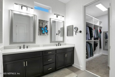 Welcome to this immaculate 4BR, 3.5BA home in the Gated - photo 34