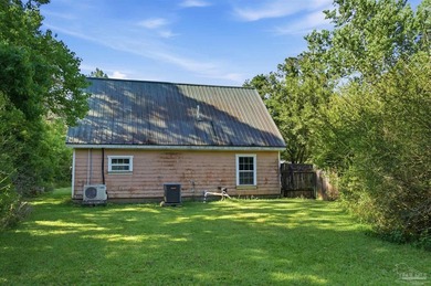 This 5.87-acre LDR-zoned property offers a quiet country setting - photo 34