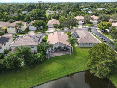 Lake Home For Sale in Palm Beach Gardens, Florida