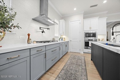 Luxury living meets effortless comfort in this highly upgraded - photo 11