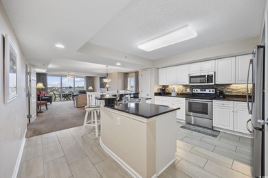 This fully furnished 3BR/3BA end unit offers a stunning