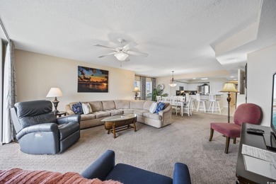 This fully furnished 3BR/3BA end unit offers a stunning