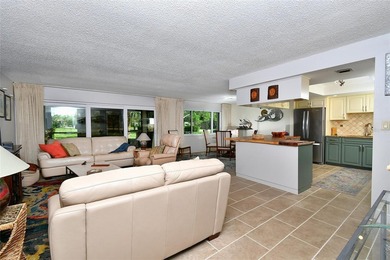 THE UNIT FEATURES NEW TILE FLOORING. IT HAS A SPACIOUS OPEN / - photo 5