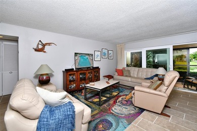 THE UNIT FEATURES NEW TILE FLOORING. IT HAS A SPACIOUS OPEN / - photo 7