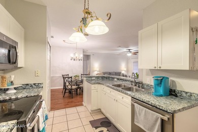 WELCOME HOME TO THIS BEAUTIFULLY MAINTAINED AND MOVE-IN READY - photo 3