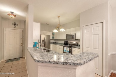 WELCOME HOME TO THIS BEAUTIFULLY MAINTAINED AND MOVE-IN READY - photo 6