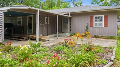 This home has so many fun attributes! It has a screened front - photo 3