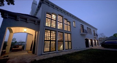 Located on approximately 1.5 gated lakefront acres just off - photo 6